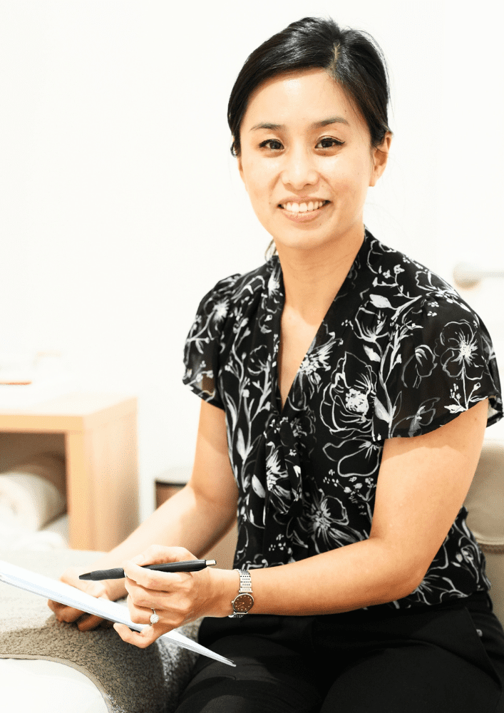 Woman receiving acupuncture therapy