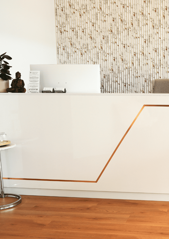 Woman receiving acupuncture therapy