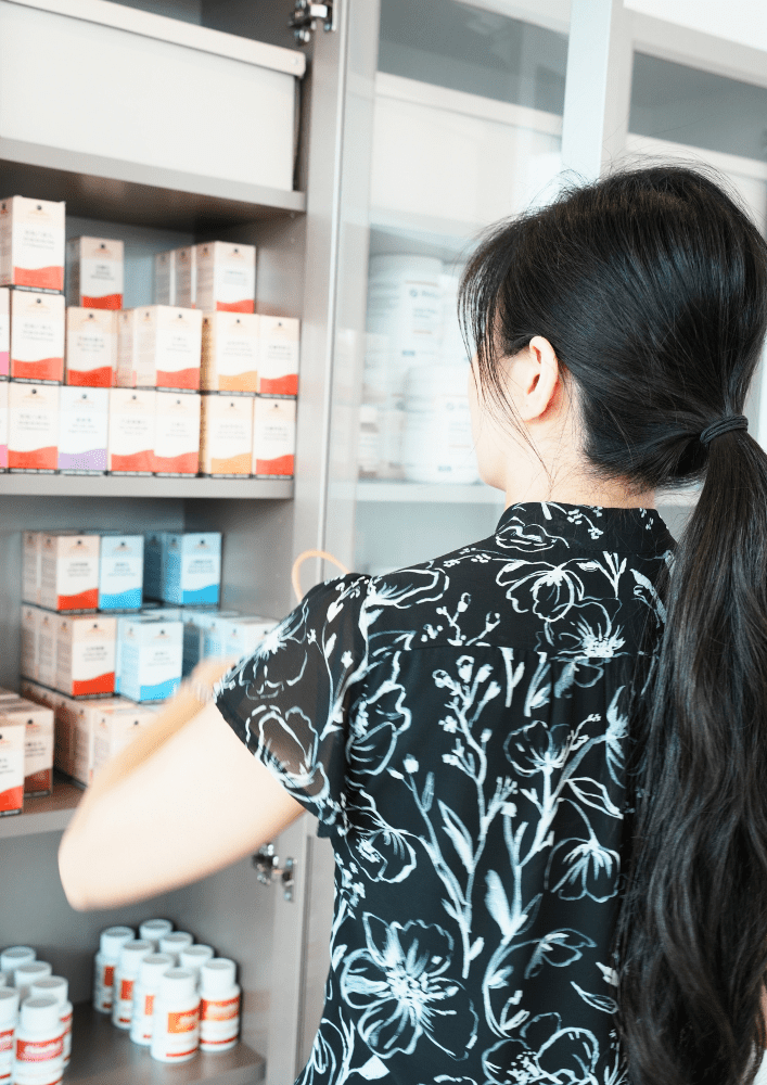 Woman receiving acupuncture therapy